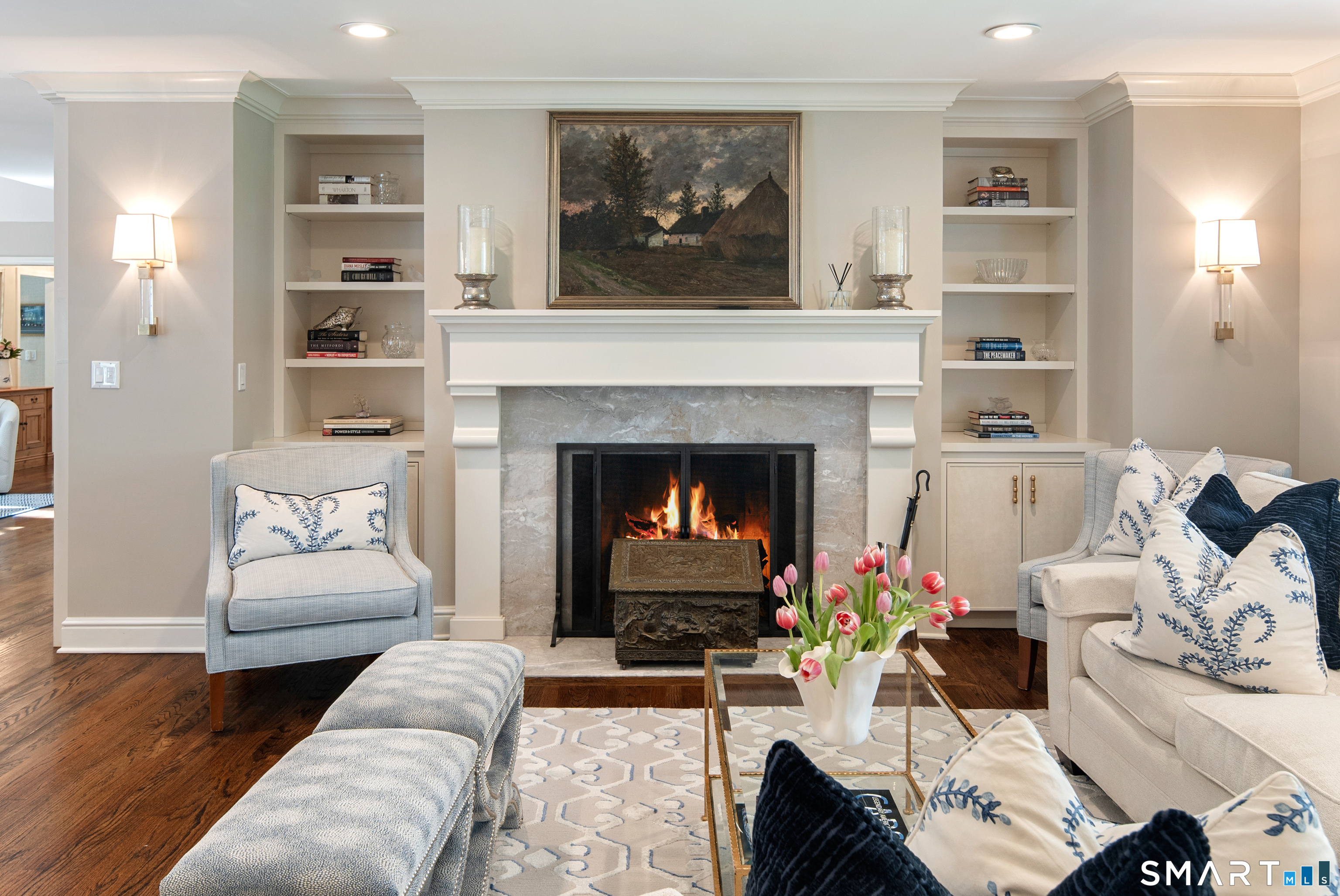 11 McLaren Road South Darien, CT 06820 - Photo 8 of 40 a living room with furniture and a fireplace