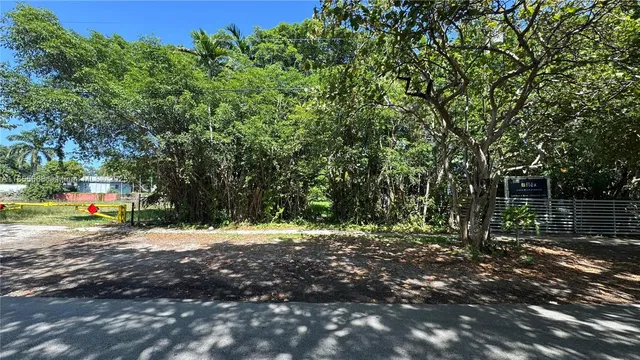 a view of outdoor space with deck and tree