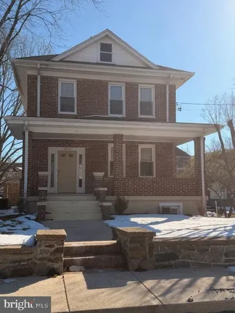 a front view of house with yard