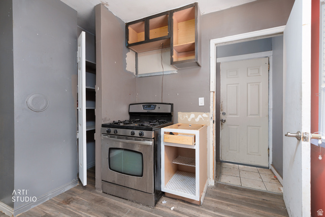 330 West 600th Street South Provo, UT 84601 - Photo 12 of 26 Stainless steel gas range with a black cooktop