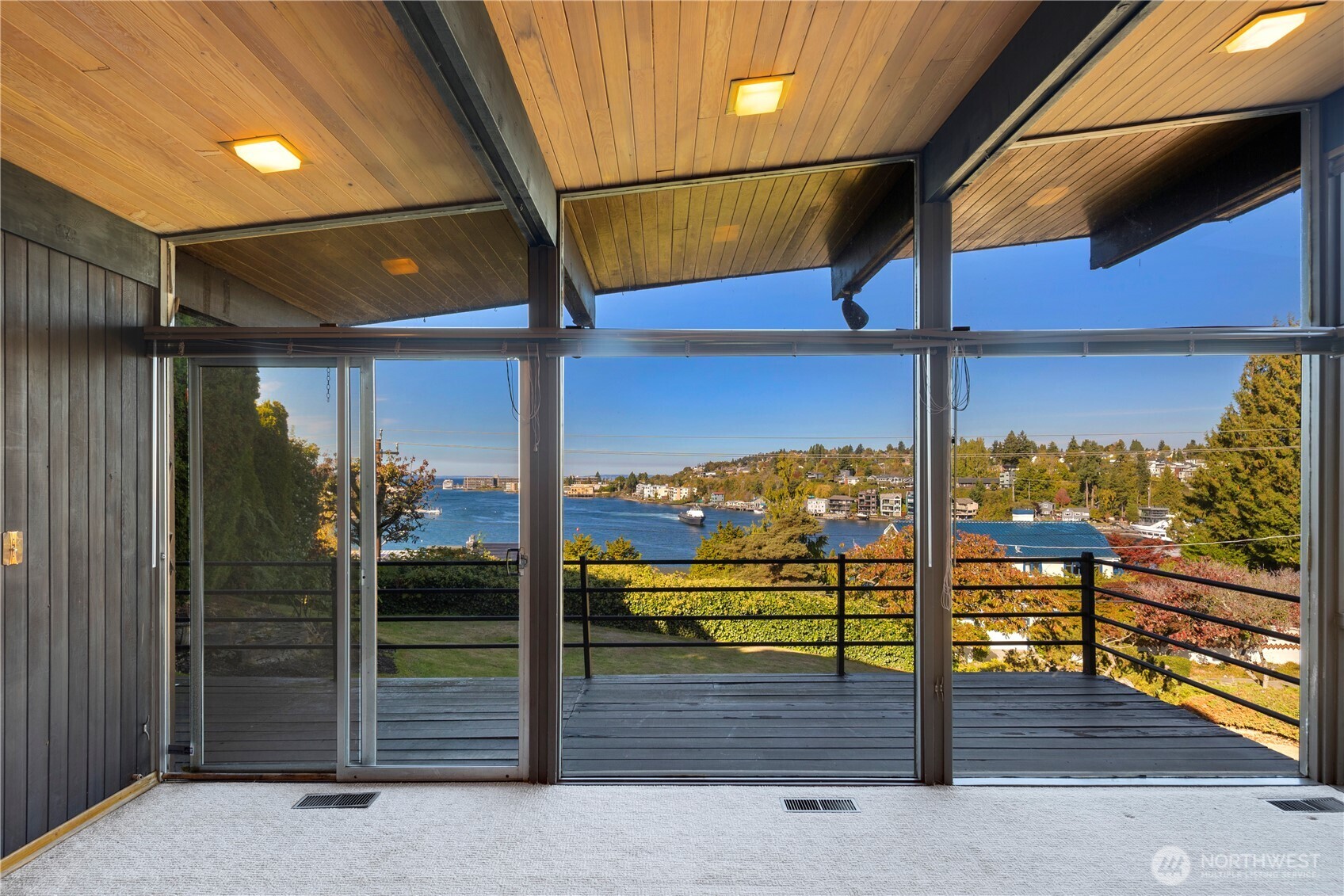 3653 West Commodore Way Seattle, WA 98199 - Photo 9 of 35 a view of a street with an outdoor seating