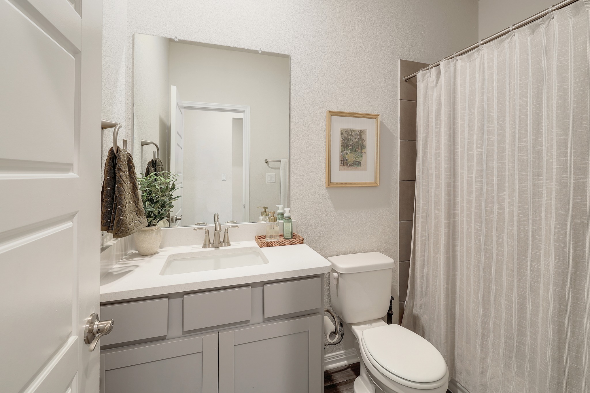 144 Sungrove Trail Georgetown, TX 78628 - Photo 15 of 40 A full bathroom is located just off the bedroom on the main floor.