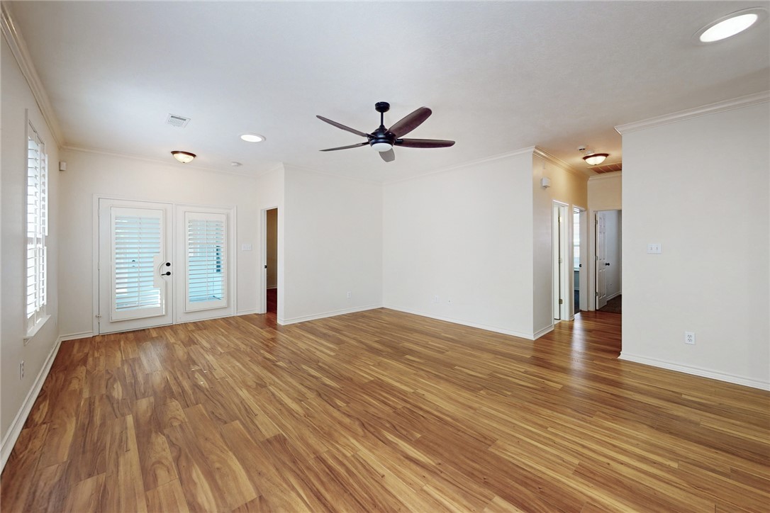 2619 Trophy Drive Bryan, TX 77802 - Photo 11 of 28 a view of a livingroom with a hardwood floor and a ceiling fan