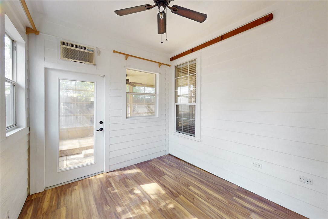 2619 Trophy Drive Bryan, TX 77802 - Photo 13 of 28 a view of empty room with wooden floor and fan