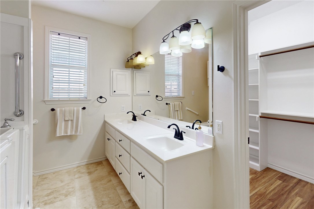 2619 Trophy Drive Bryan, TX 77802 - Photo 20 of 28 a bathroom with a double vanity sink mirror and double