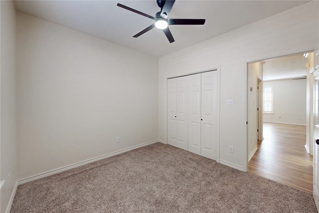 2619 Trophy Drive Bryan, TX 77802 - Photo 24 of 28 a view of an empty room and wooden floor