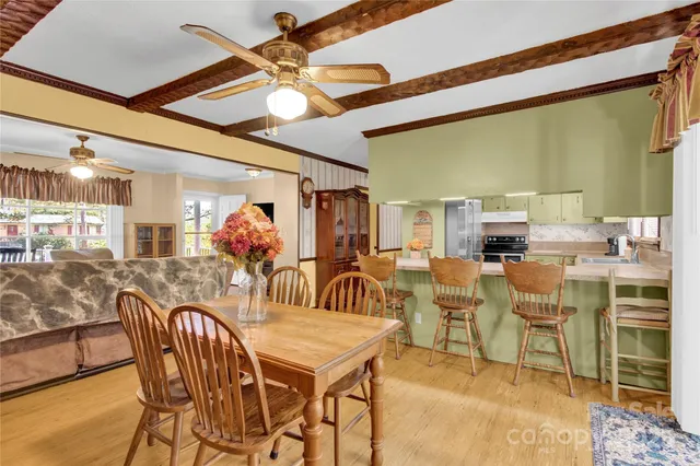 a view of a dining room with furniture