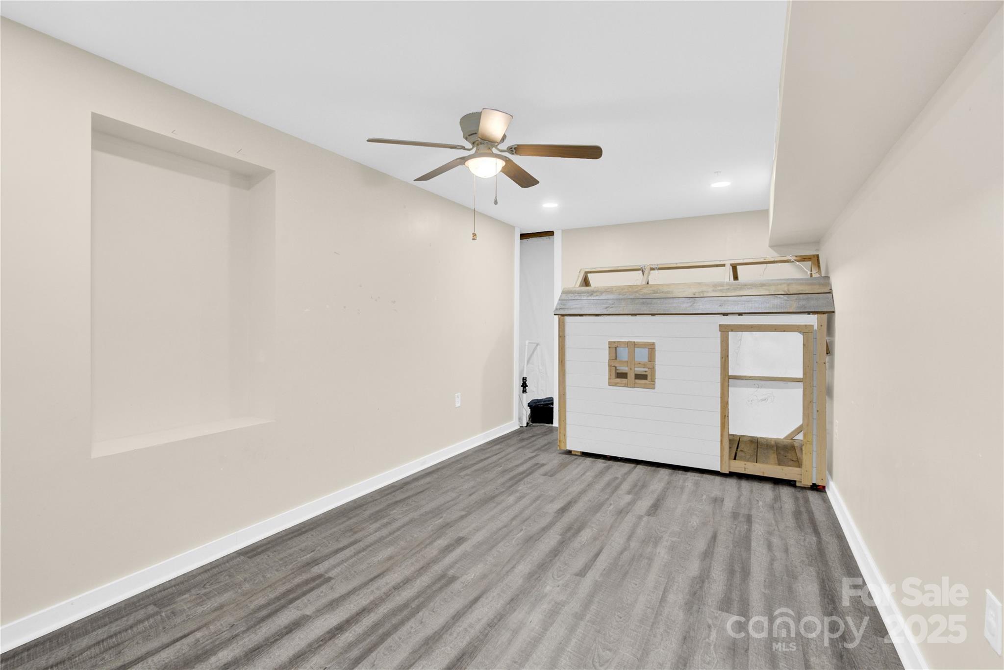 841 Knowles Drive Dallas, NC 28034 - Photo 40 of 46 a view of a kitchen with a sink and wooden floor