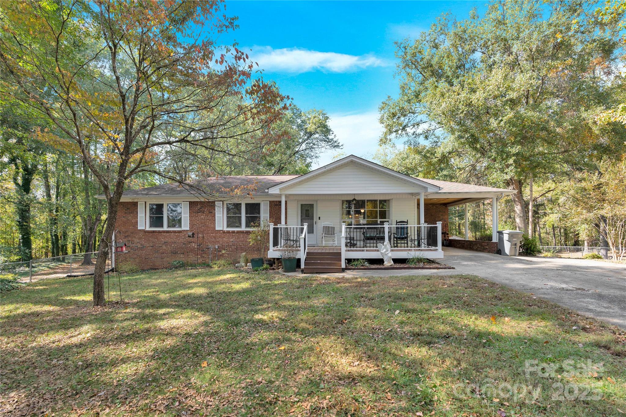 841 Knowles Drive Dallas, NC 28034 - Photo 4 of 46 a front view of a house with yard