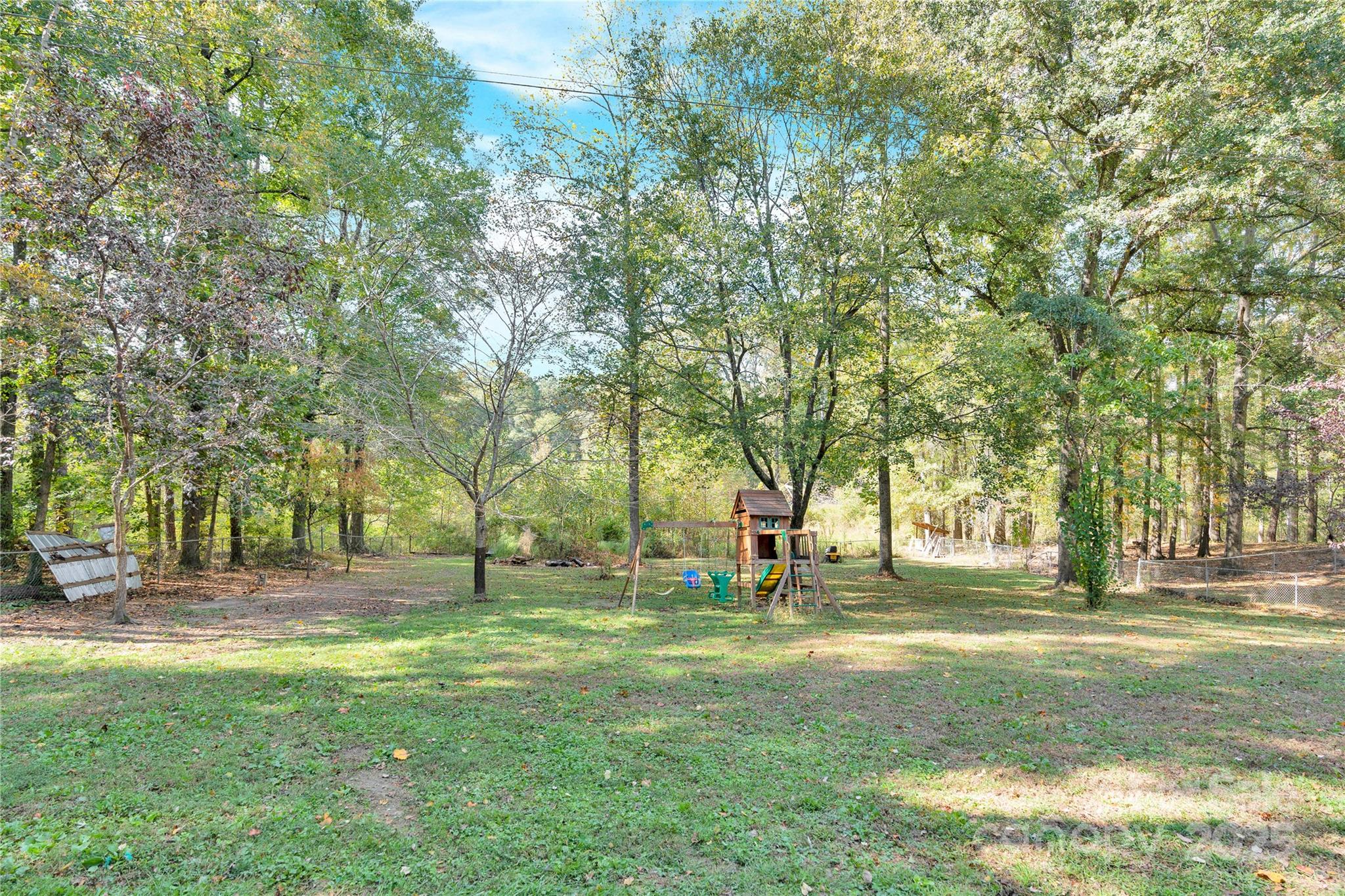 841 Knowles Drive Dallas, NC 28034 - Photo 45 of 46 a garden view with trees