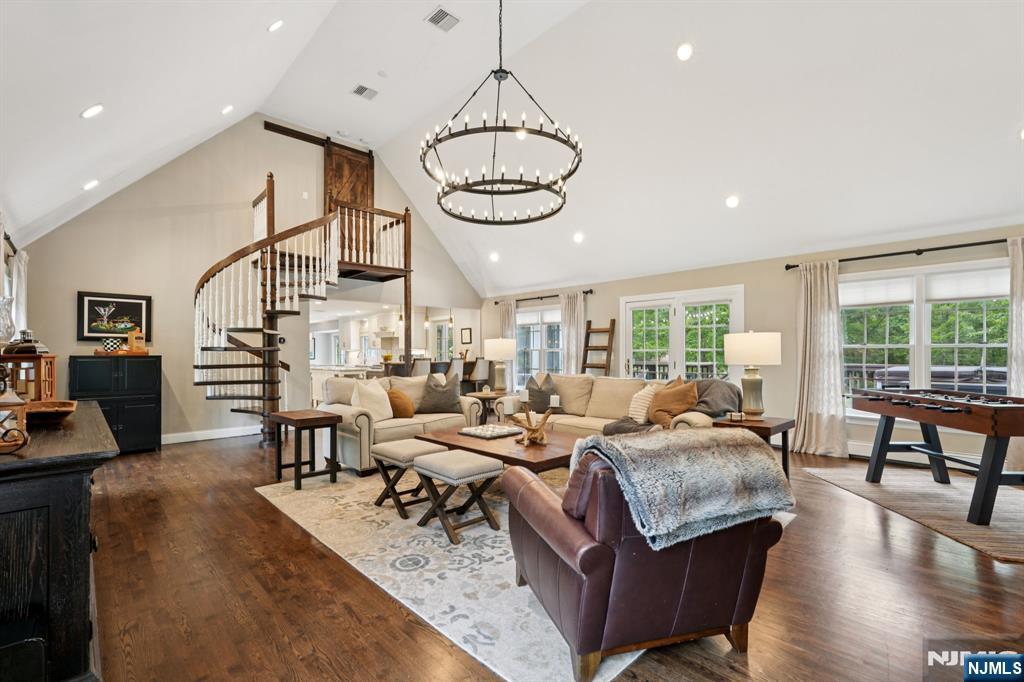 1015 High Mountain Road Franklin Lakes, NJ 07417 - Photo 11 of 48 a living room with furniture a rug and a large window