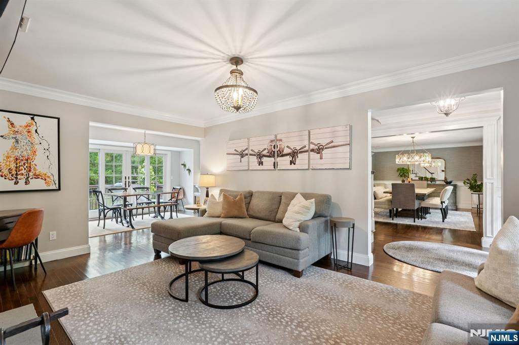 1015 High Mountain Road Franklin Lakes, NJ 07417 - Photo 12 of 48 a living room with furniture a table and a large window