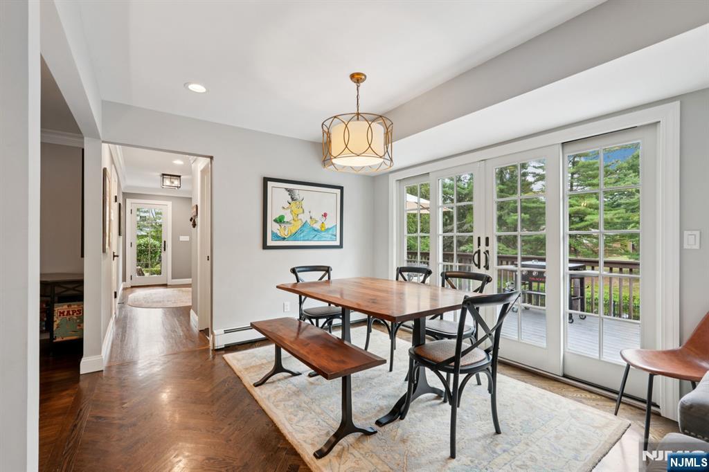 1015 High Mountain Road Franklin Lakes, NJ 07417 - Photo 16 of 48 a view of a dining room with furniture window and wooden floor