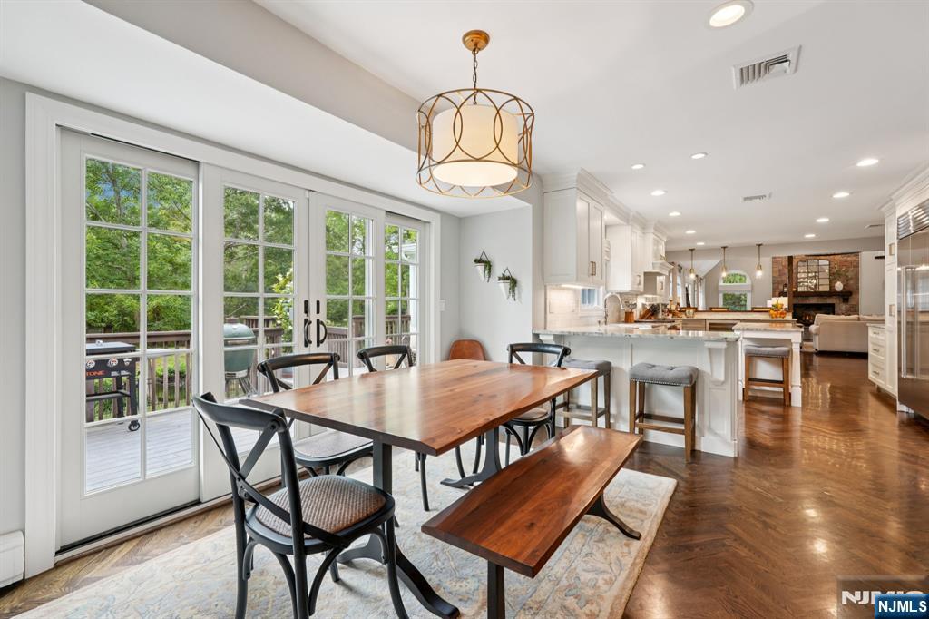 1015 High Mountain Road Franklin Lakes, NJ 07417 - Photo 17 of 48 a view of a dining room with furniture window and wooden floor