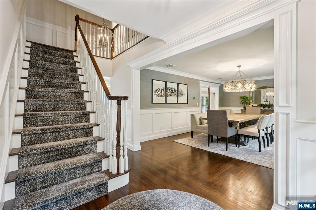 1015 High Mountain Road Franklin Lakes, NJ 07417 - Photo 19 of 48 a view of a livingroom with furniture staircase and a dining room