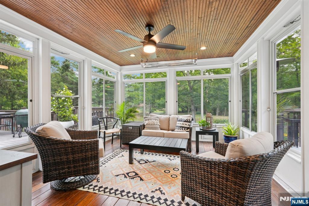 1015 High Mountain Road Franklin Lakes, NJ 07417 - Photo 23 of 48 a living room with furniture and a large window