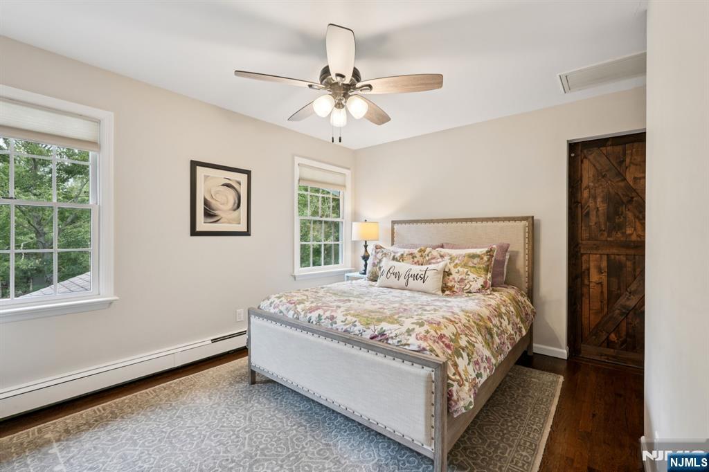 1015 High Mountain Road Franklin Lakes, NJ 07417 - Photo 25 of 48 a bedroom with a large bed and a window