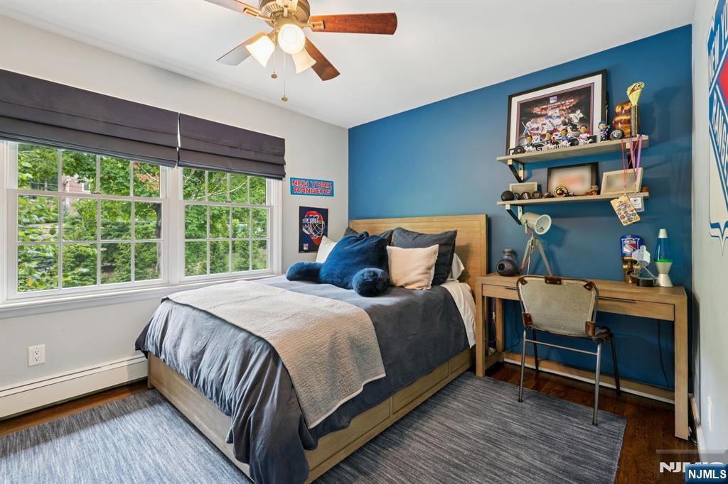 1015 High Mountain Road Franklin Lakes, NJ 07417 - Photo 26 of 48 a bedroom with a bed and a large window