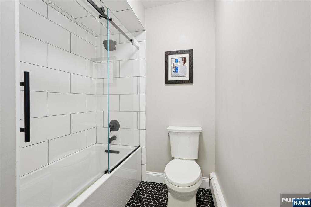 1015 High Mountain Road Franklin Lakes, NJ 07417 - Photo 28 of 48 a bathroom with a toilet and a shower