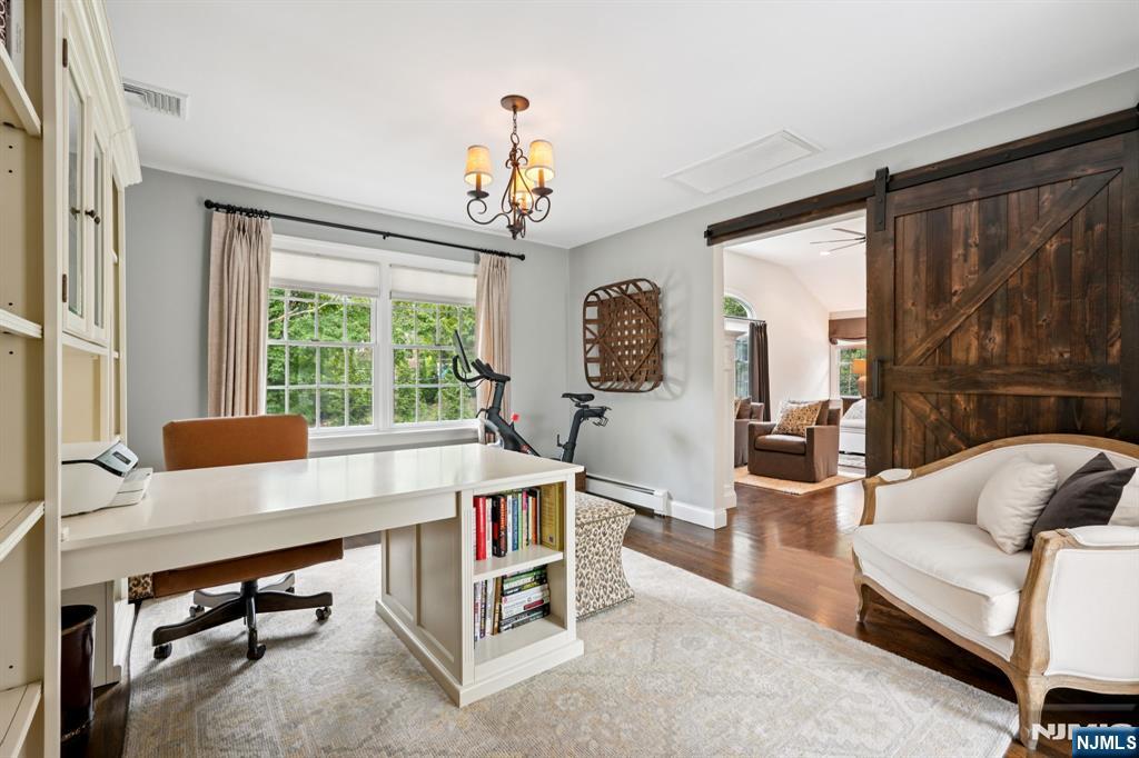 1015 High Mountain Road Franklin Lakes, NJ 07417 - Photo 32 of 48 a view of a livingroom with furniture and window