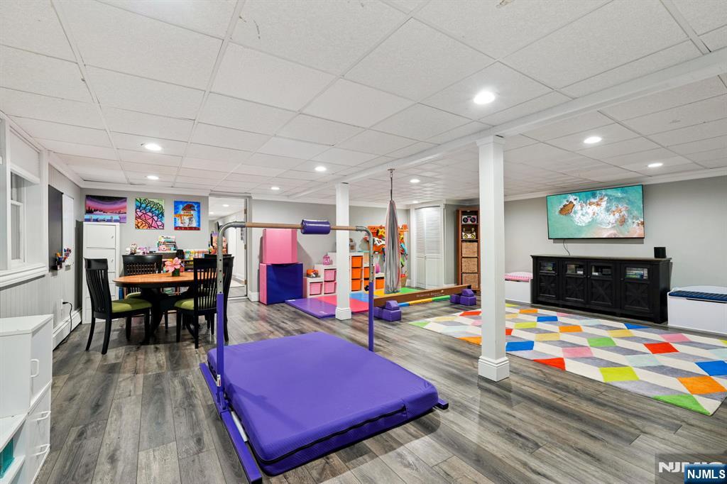 1015 High Mountain Road Franklin Lakes, NJ 07417 - Photo 38 of 48 a living room with furniture and wooden floor