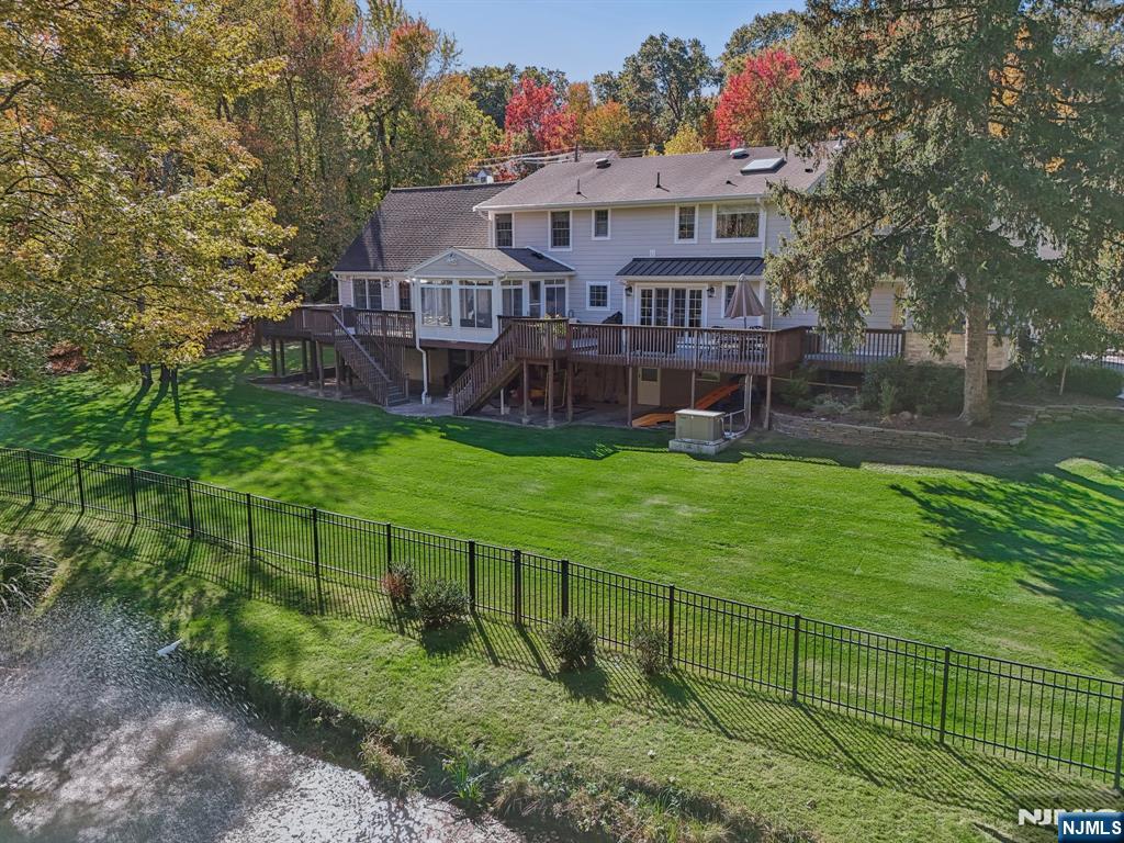1015 High Mountain Road Franklin Lakes, NJ 07417 - Photo 7 of 48 a view of house with a big yard
