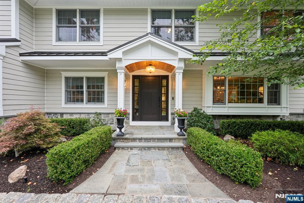 1015 High Mountain Road Franklin Lakes, NJ 07417 - Photo 8 of 48 a view of a building with a window and a tree