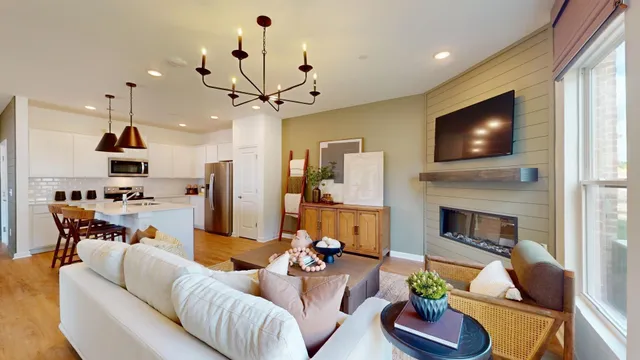 a view of a dining room with furniture and window