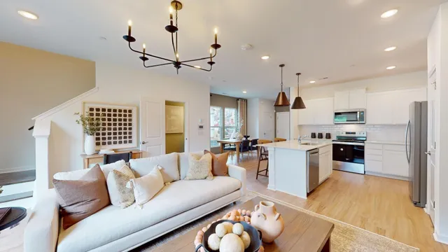 a bedroom with furniture and a chandelier