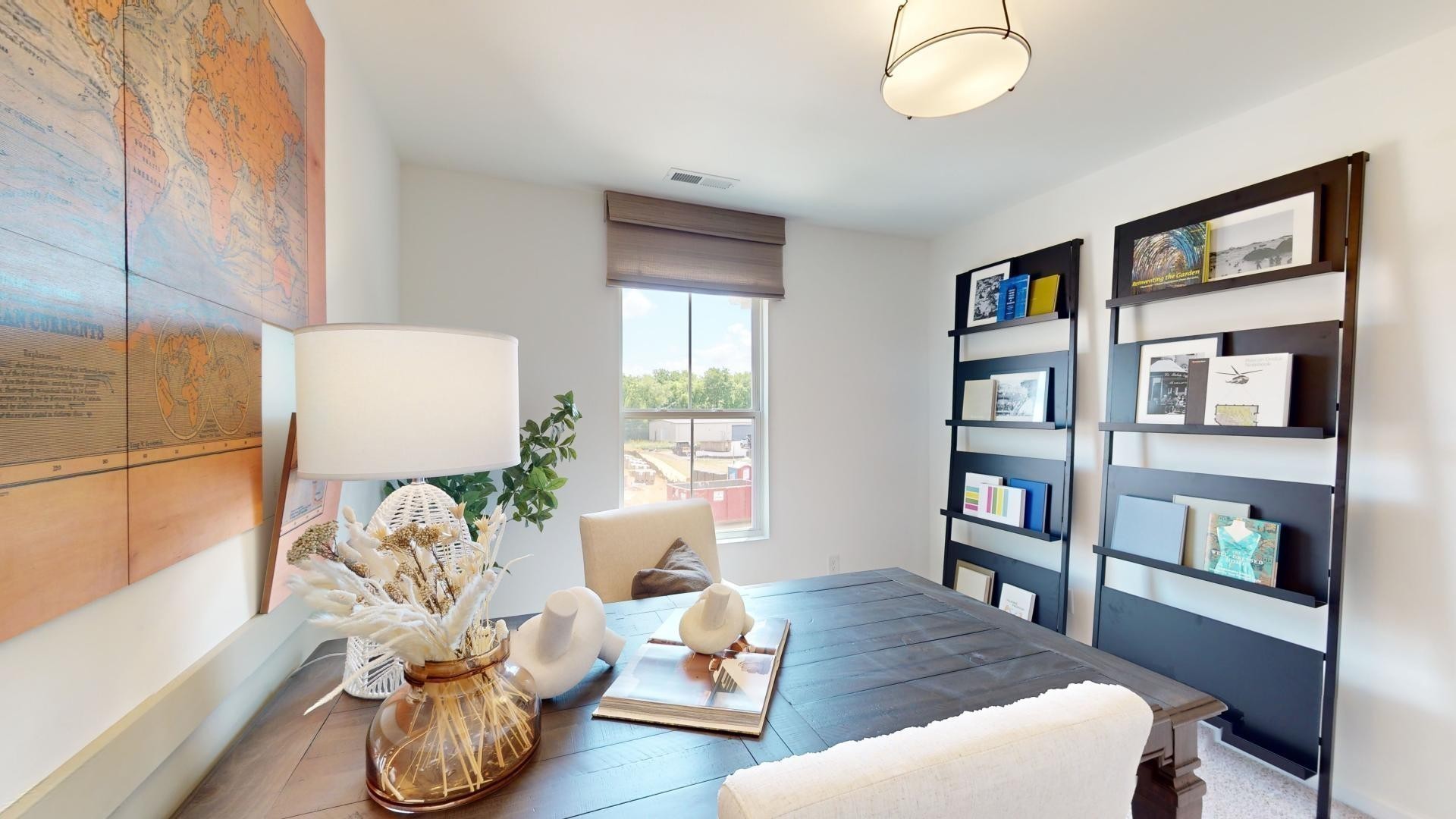 7110 Mapleside Lane Fairview, TN 37062 - Photo 32 of 49 a living room with furniture and a book shelf