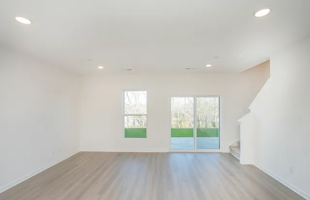 an empty room with windows