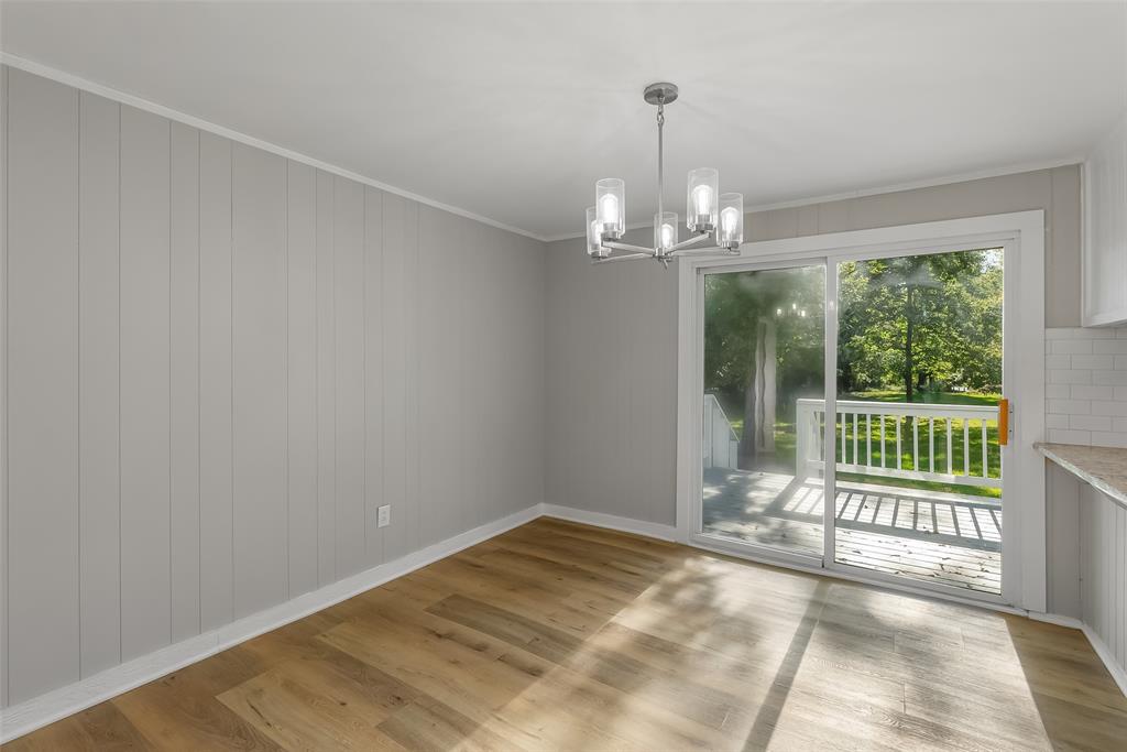 224 Prysock Road Doyline, LA 71023 - Photo 6 of 34 a view of an empty room with wooden floor and a window
