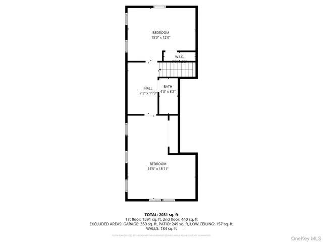 a picture of a bench in front of a wall