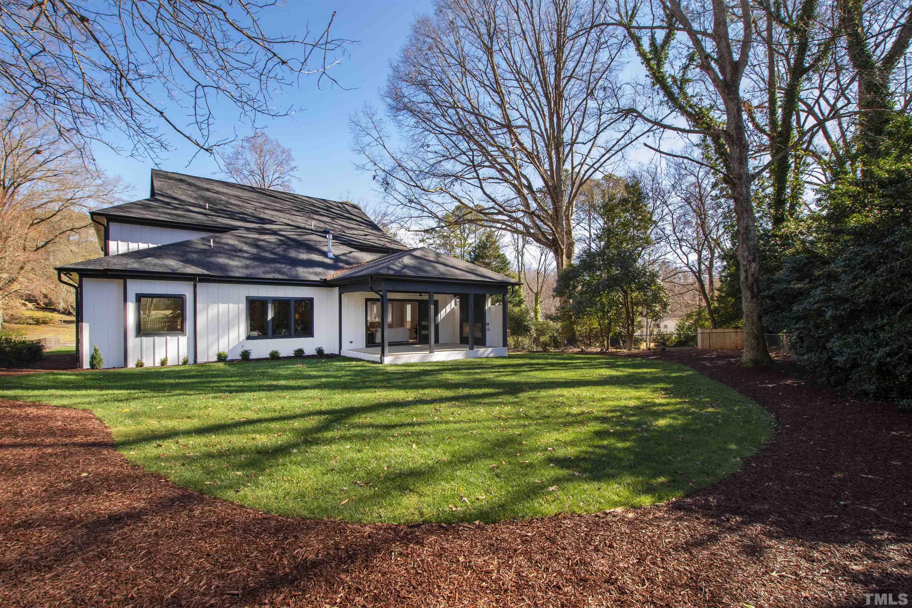 604 Yale Street Raleigh, NC 27609 - Photo 50 of 74 a front view of a house with a garden
