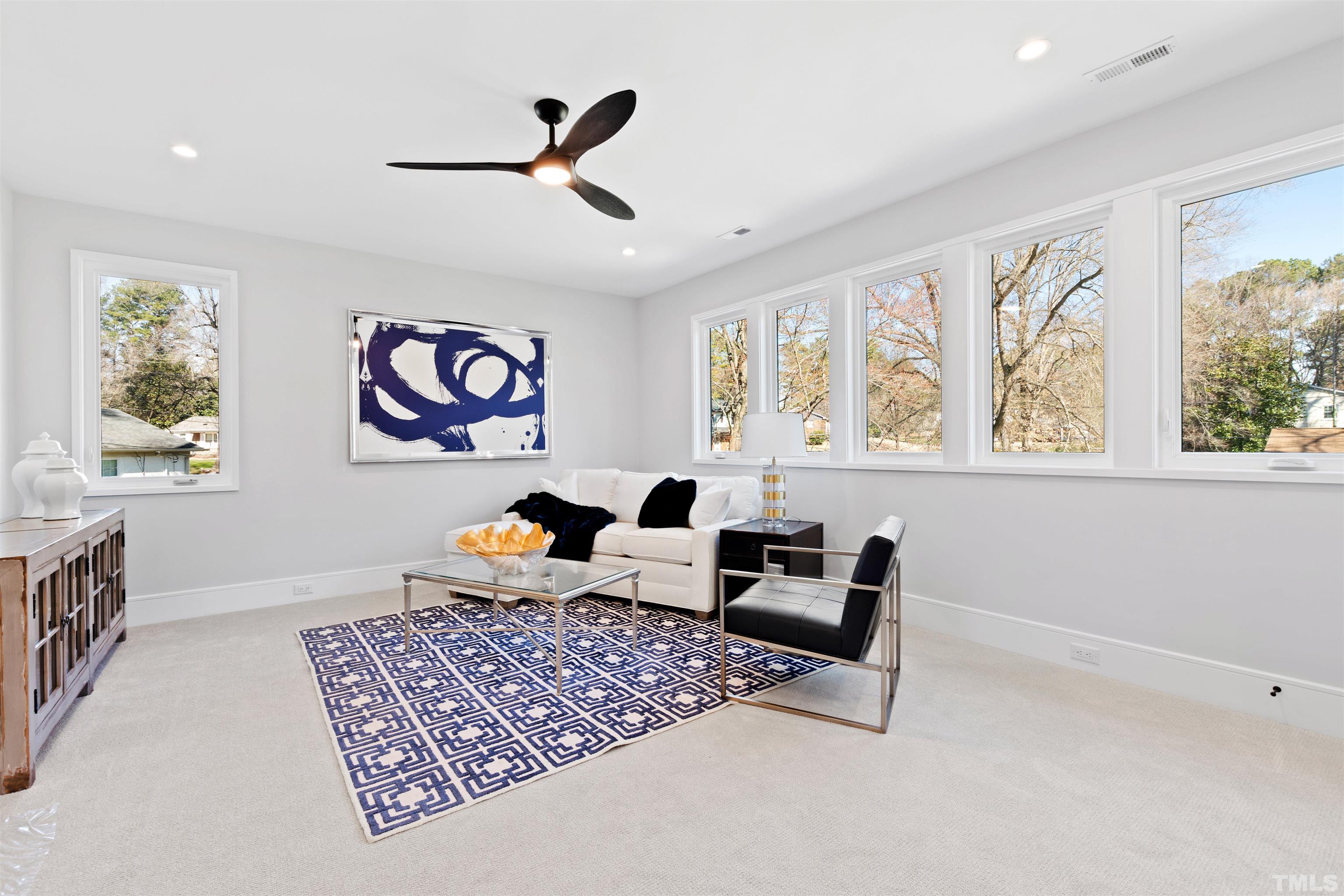 604 Yale Street Raleigh, NC 27609 - Photo 58 of 74 a bedroom with furniture and a window