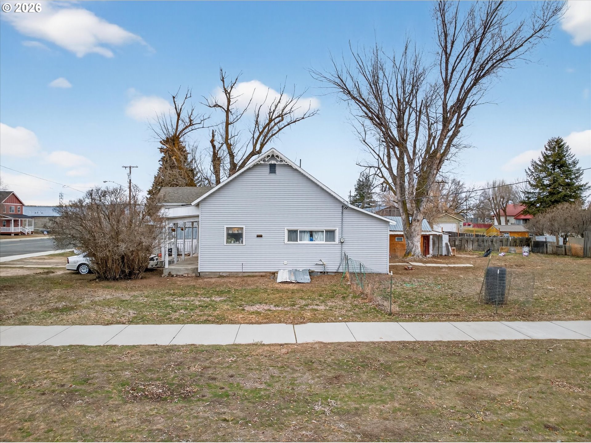 295 E Street North Powder, OR 97867 - Photo 5 of 12 a view of a house with a yard covered with snow in front of house