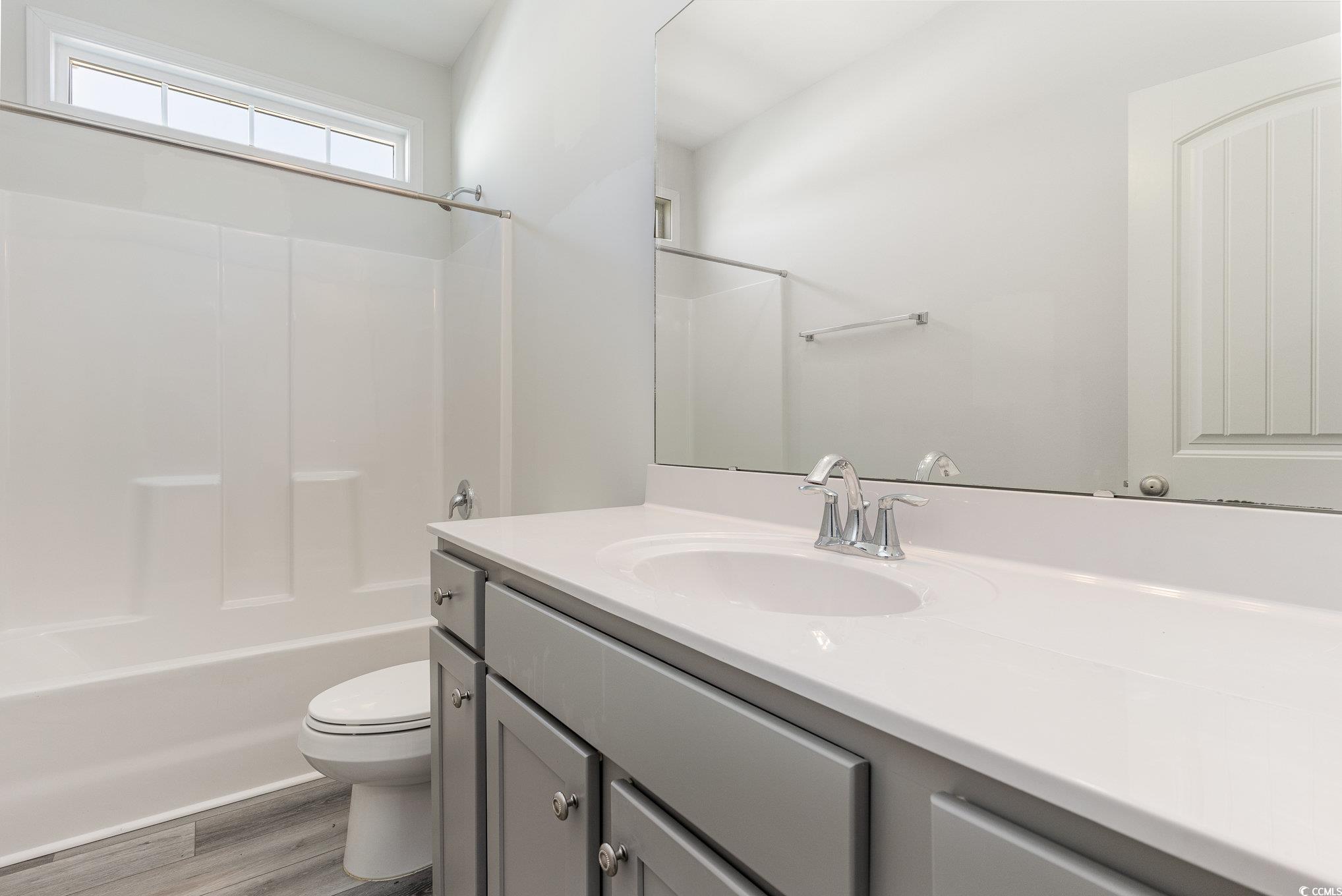 577 Rycola Circle Surfside Beach, SC 29575 - Photo 19 of 28 Bathroom featuring tub / shower combination, vanit