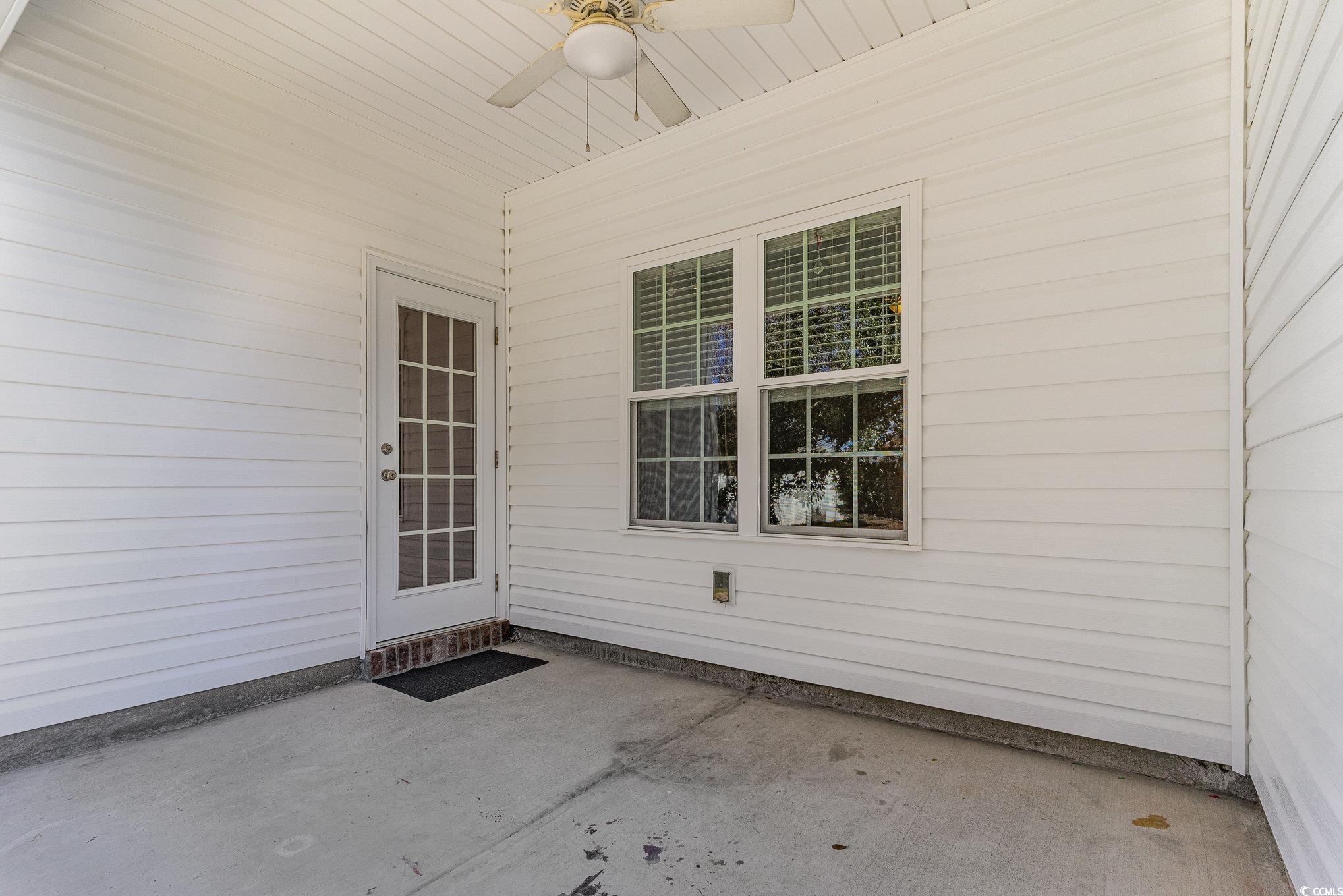 577 Rycola Circle Surfside Beach, SC 29575 - Photo 24 of 28 Doorway to property featuring ceiling fan and a pa