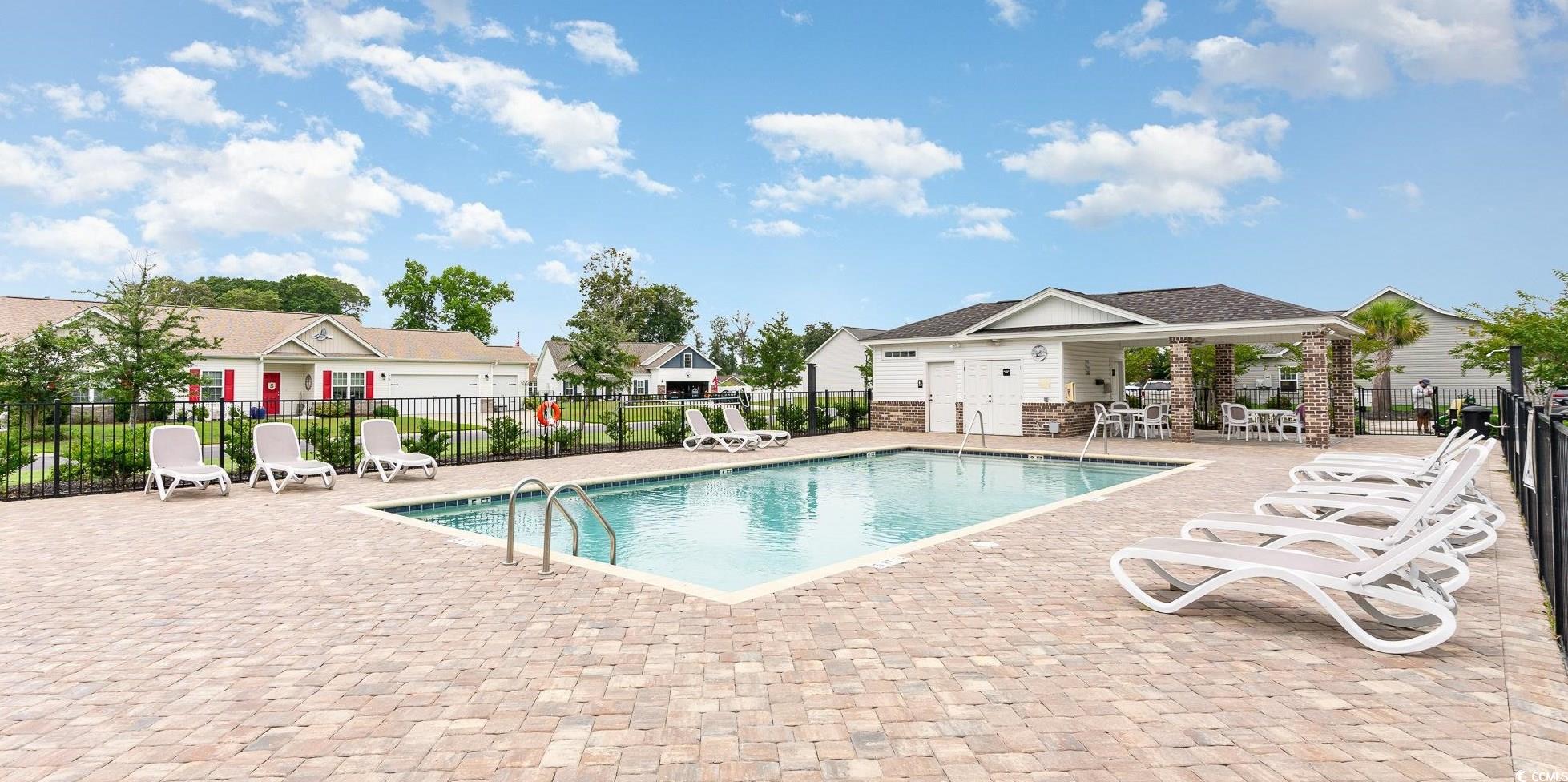 577 Rycola Circle Surfside Beach, SC 29575 - Photo 25 of 28 Pool featuring a residential view, fence, a gazebo