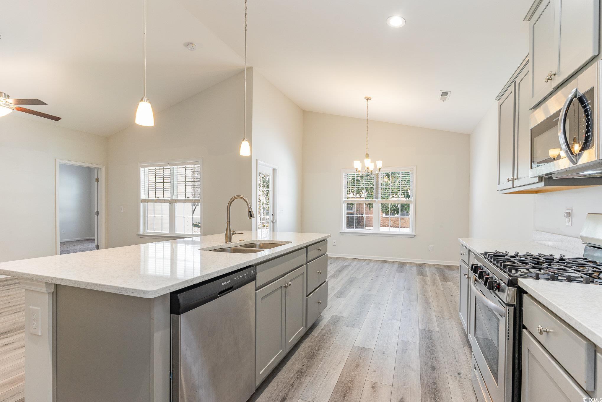 577 Rycola Circle Surfside Beach, SC 29575 - Photo 6 of 28 Kitchen featuring decorative light fixtures, a kit
