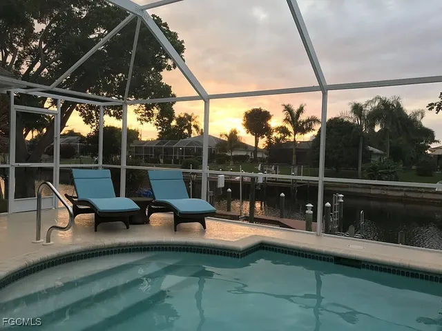 a view of sitting area with swimming pool