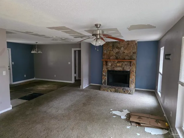 a view of a livingroom with a fireplace