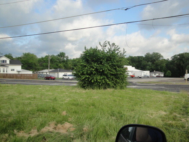 1607 Maple Road Joliet, IL 60432 - Photo 5 of 12 a view of yard with car parked