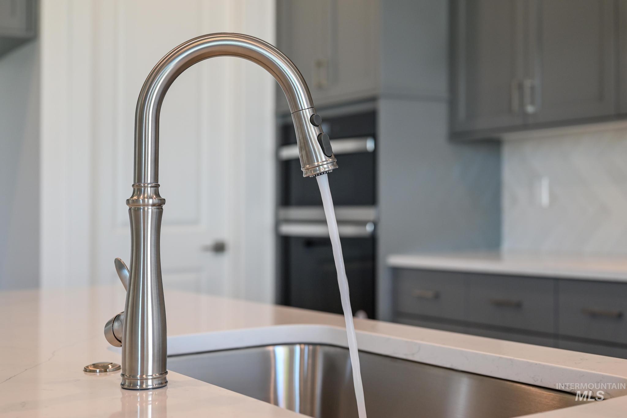 5416 Sparky Avenue Caldwell, ID 83607 - Photo 13 of 42 Kitchen view of gray cabinetry and a sink