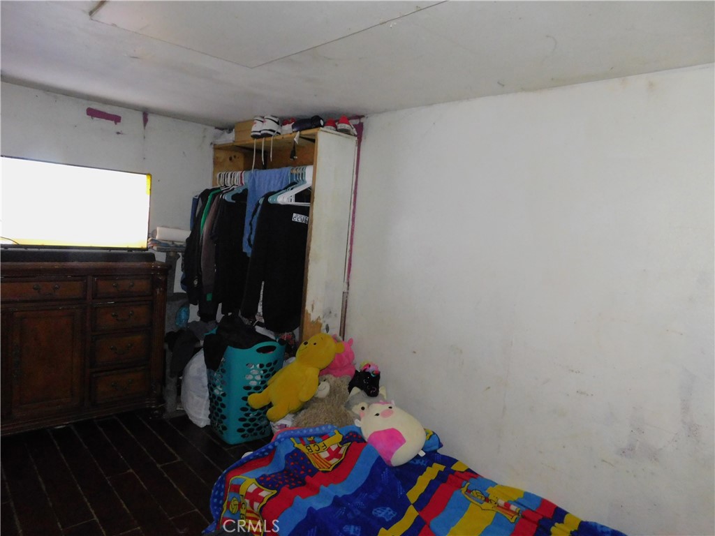 1097 North State Street, Unit 557 Hemet, CA 92543 - Photo 15 of 18 a room with toys and closet