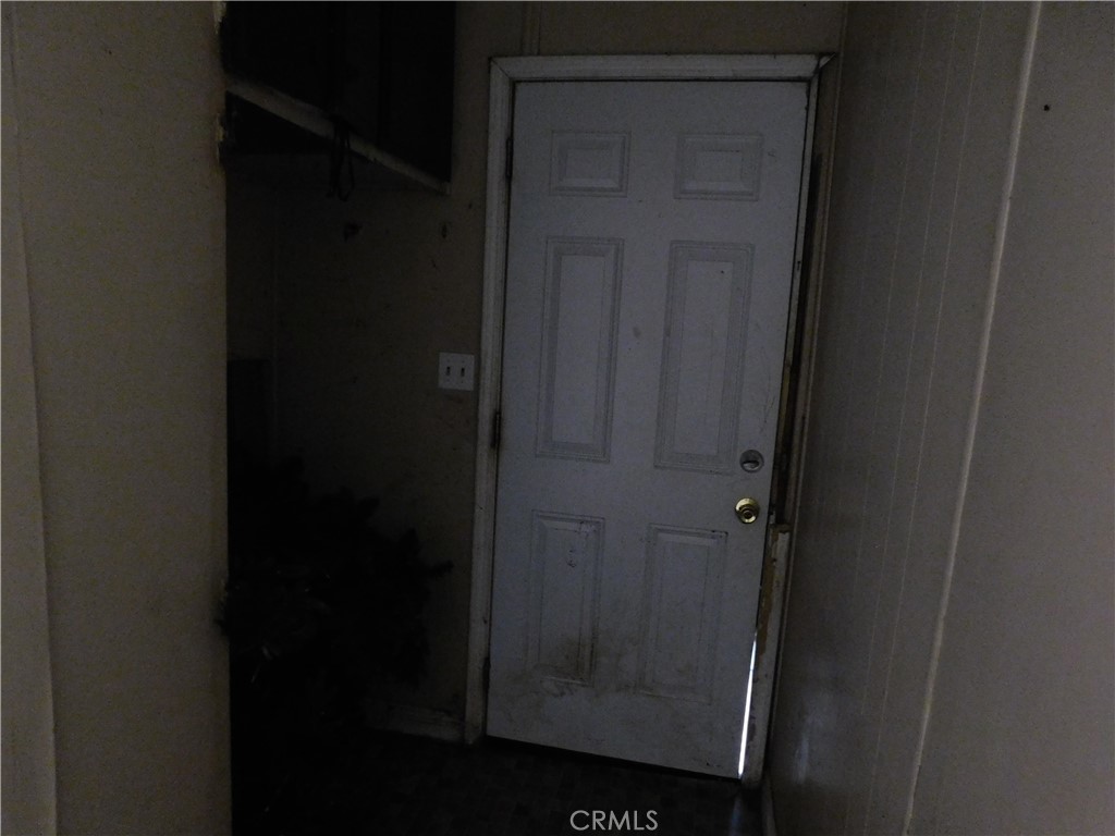 1097 North State Street, Unit 557 Hemet, CA 92543 - Photo 10 of 18 a bathroom with a glass door