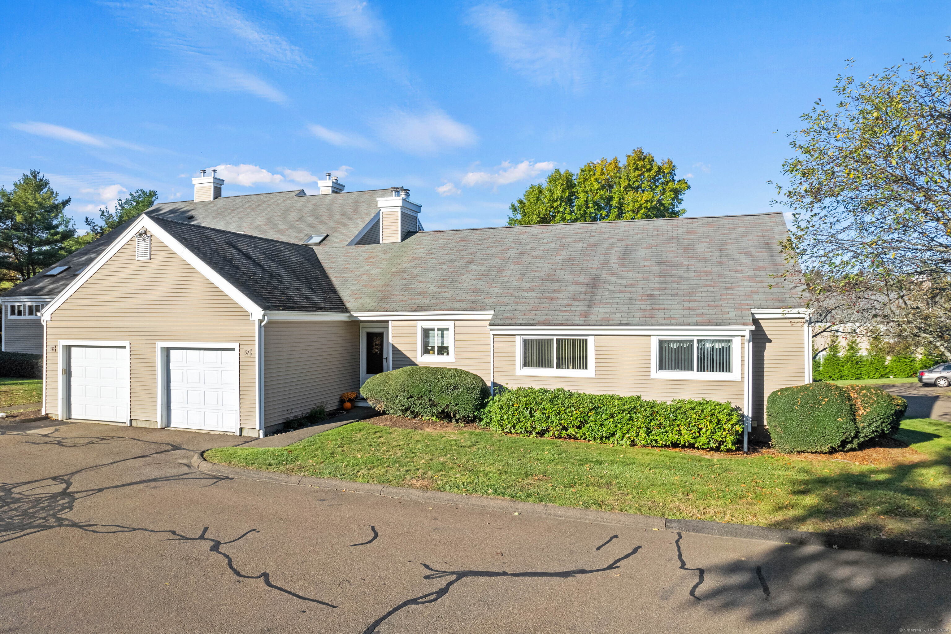 57 Jerimoth Drive, Unit 57 Branford, CT 06405 - Photo 1 of 1 front view of a house with a yard