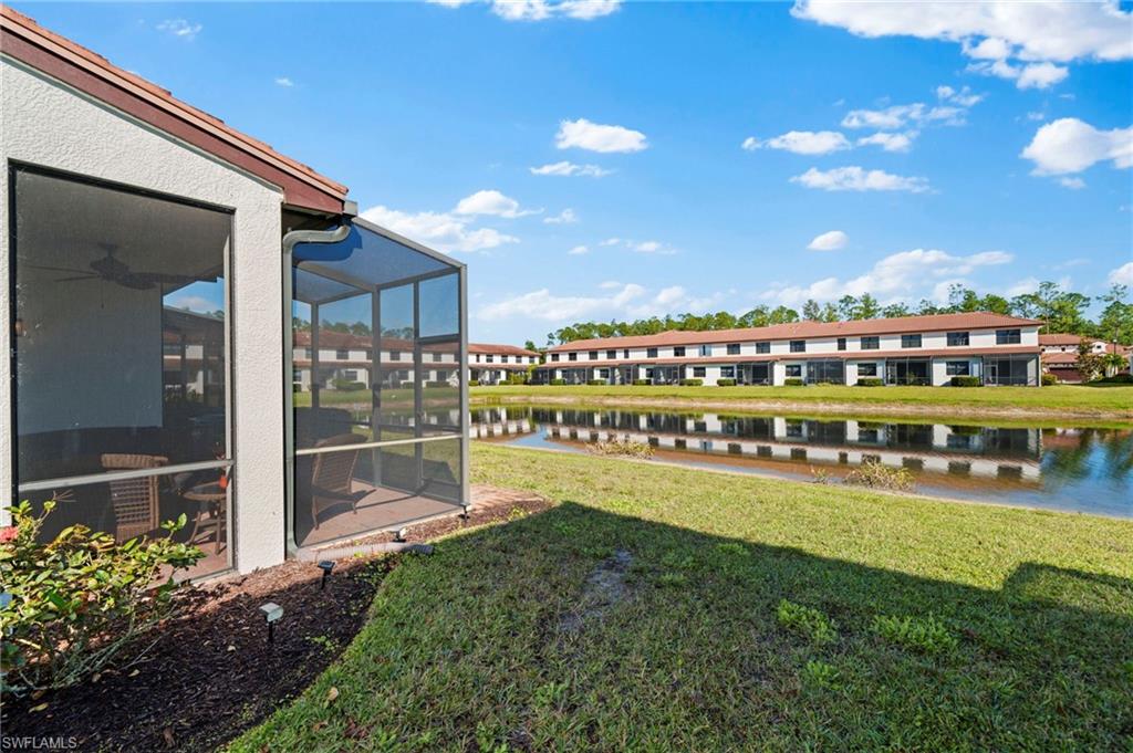 7766 Bristol Circle Naples, FL 34120 - Photo 2 of 30 View of yard with a water view