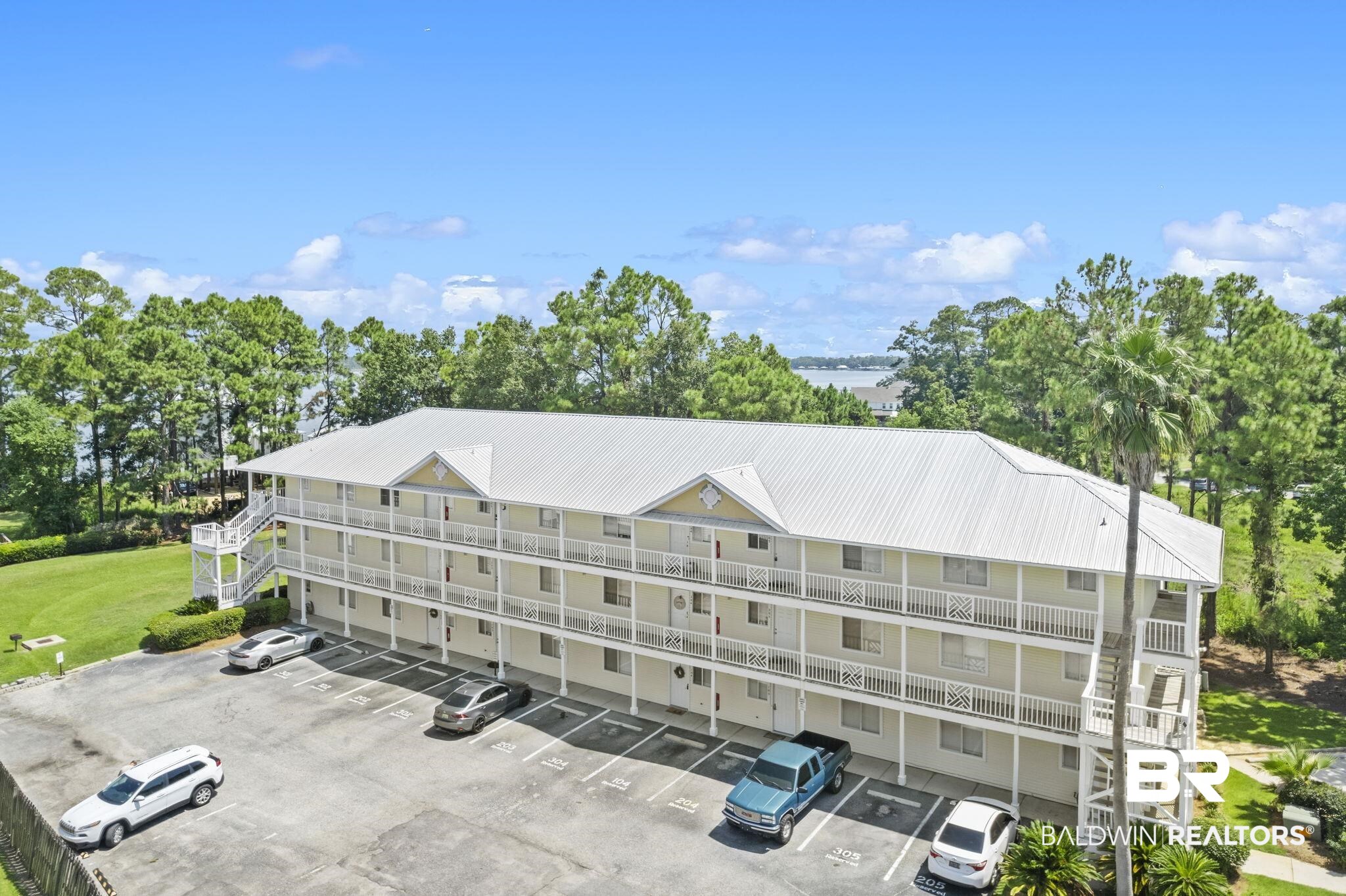 25957 Canal Road, Unit 302 Orange Beach, AL 36561 - Photo 2 of 26 View of building exterior
