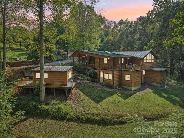 a view of a house with a small yard